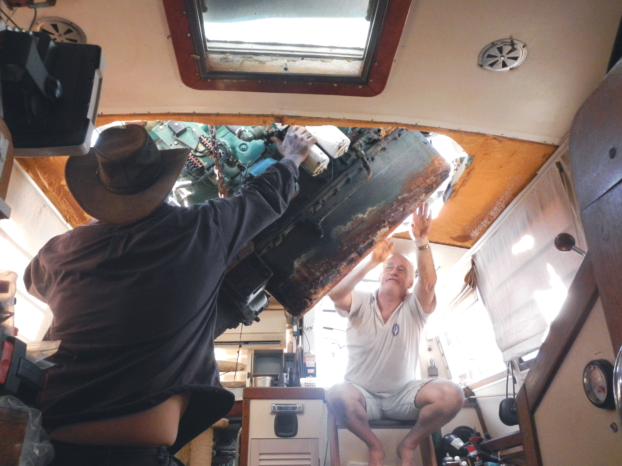 Dave assisting the motor out of the boat